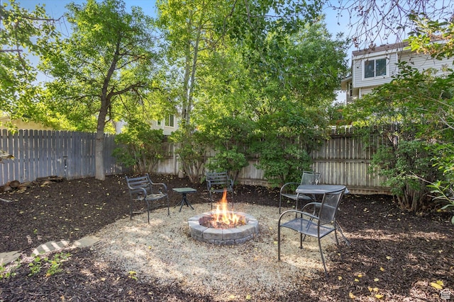 1153 N 280 W, American Fork, UT 84003 - fenced backyard with an outdoor fire pit
