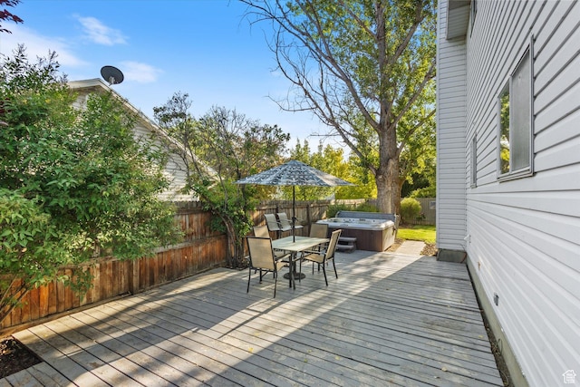1153 N 280 W, American Fork, UT 84003 - deck featuring a hot tub, a fenced backyard, and outdoor dining area