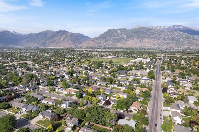 1153 N 280 W, American Fork, UT 84003 - aerial view of property and surrounding area with a mountainous background and nearby suburban area