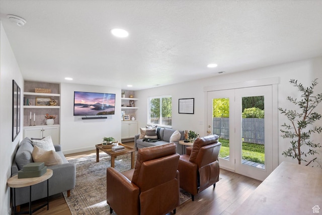 1153 N 280 W, American Fork, UT 84003 - living area featuring wood finished floors, recessed lighting, and built in shelves