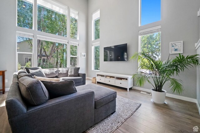 591 S Emerald Ln W, Lehi, UT 84043 - living room with a high ceiling and wood finished floors