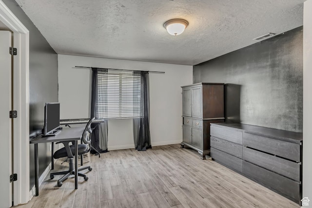 11645 S Keystone Dr, South Jordan, UT 84009 - office area with light wood-type flooring and a textured ceiling