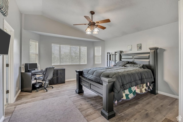 11645 S Keystone Dr, South Jordan, UT 84009 - bedroom featuring lofted ceiling, a desk, light wood finished floors, and ceiling fan