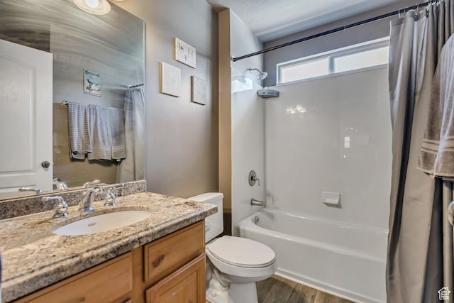 11645 S Keystone Dr, South Jordan, UT 84009 - bathroom featuring shower / bath combination with curtain, vanity, and wood finished floors
