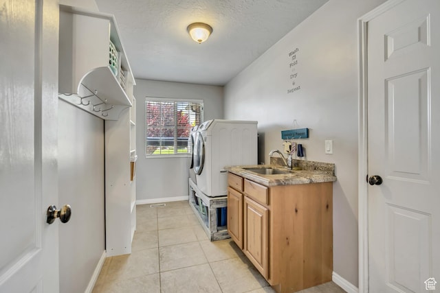 11645 S Keystone Dr, South Jordan, UT 84009 - laundry room featuring light tile patterned flooring, cabinet space, and independent washer and dryer