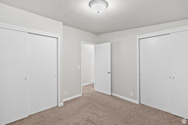 4303 Gramercy Ave, South Ogden, UT 84403 - unfurnished bedroom featuring carpet flooring and a textured ceiling