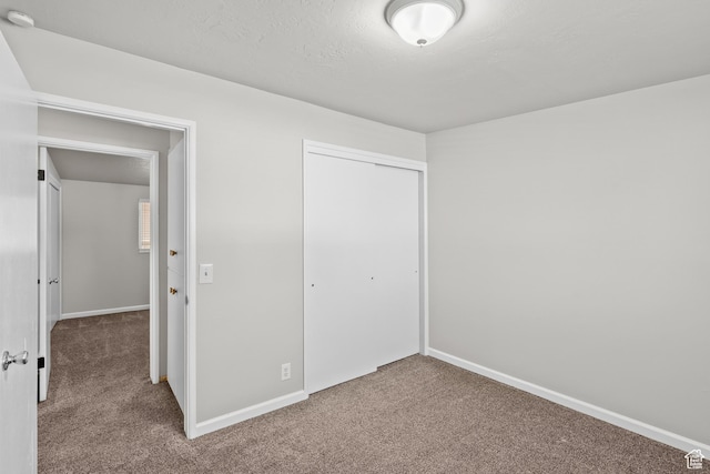 4303 Gramercy Ave, South Ogden, UT 84403 - unfurnished bedroom featuring carpet flooring and a closet