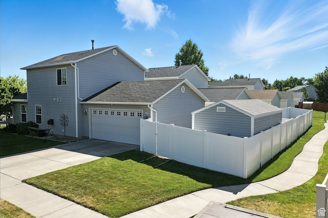 632 W 100 N, Spanish Fork, UT 84660 - view of home's exterior featuring an attached garage, concrete driveway, and a shingled roof