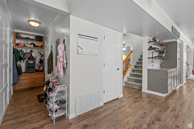 632 W 100 N, Spanish Fork, UT 84660 - foyer entrance featuring ornamental molding, wood finished floors, stairs, and ceiling fan