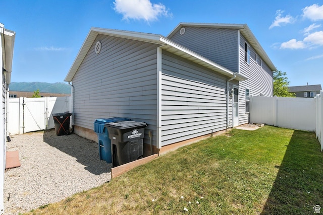 632 W 100 N, Spanish Fork, UT 84660 - view of side of home with a gate, a fenced backyard, and a mountain view