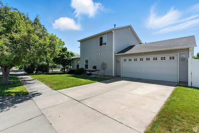 632 W 100 N, Spanish Fork, UT 84660 - view of side of home featuring a garage and concrete driveway