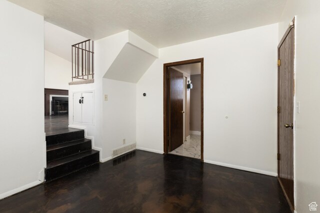 3453 W 5700 S, Taylorsville, UT 84129 - unfurnished living room with stairway and baseboards