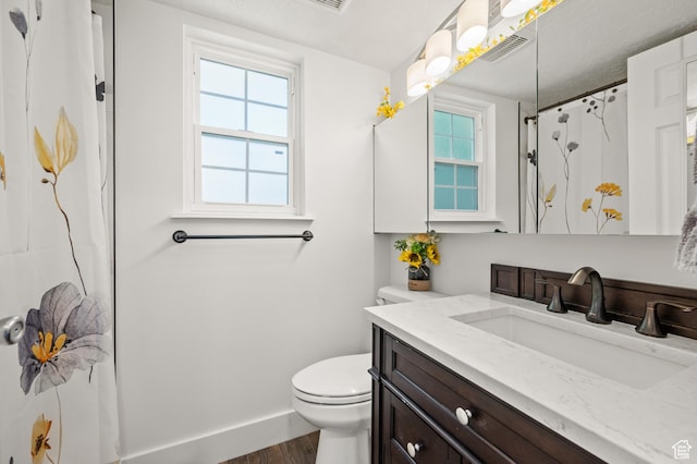 2095 S Main E Unit 5, Bountiful, UT 84010 - full bath featuring vanity, wood finished floors, and a shower with curtain