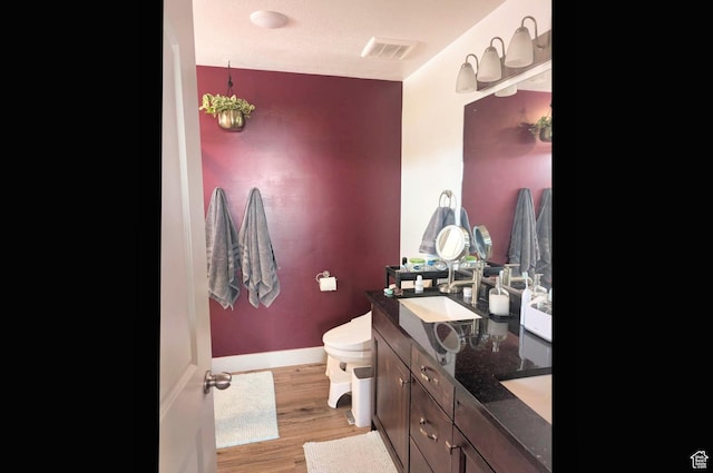1991 Redtail Cir, Wellsville, UT 84339 - bathroom with double vanity and wood finished floors