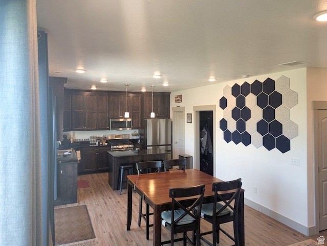 1991 Redtail Cir, Wellsville, UT 84339 - dining area with light wood-style flooring