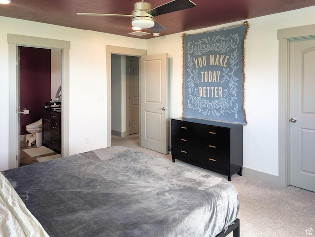 1991 Redtail Cir, Wellsville, UT 84339 - bedroom with light colored carpet, ceiling fan, and connected bathroom