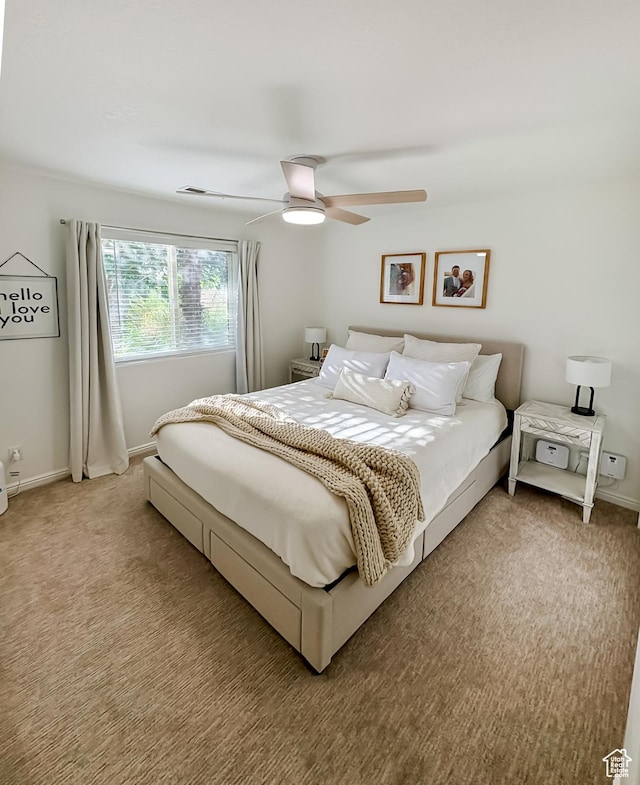 2930 E 450 N Unit F24, St George, UT 84790 - bedroom with light colored carpet and a ceiling fan