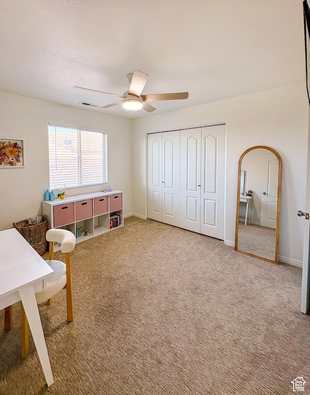 2930 E 450 N Unit F24, St George, UT 84790 - sitting room with ceiling fan and carpet