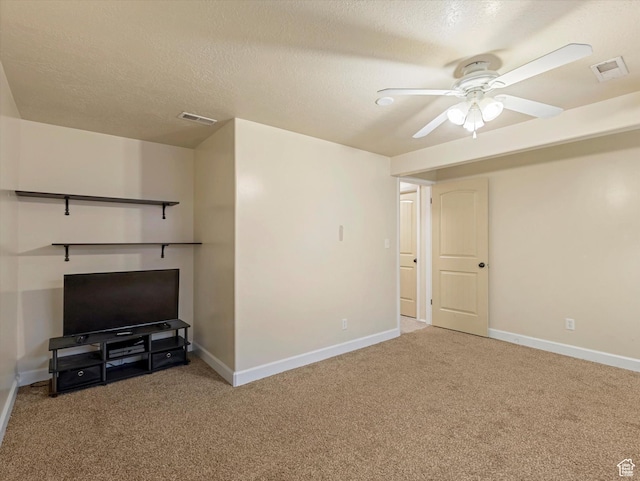 4736 S 2675 W, Roy, UT 84067 - unfurnished living room with carpet flooring, a ceiling fan, and a textured ceiling
