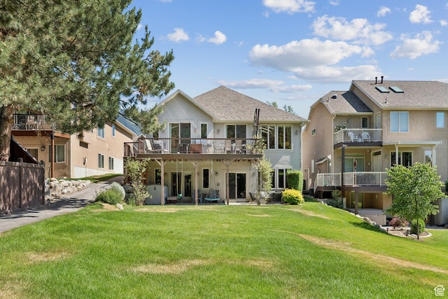 3231 E Lantern Hill Ct S, Cottonwood Heights, UT 84093 - back of house featuring a lawn, a wooden deck, and stucco siding