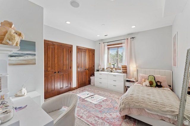 3231 E Lantern Hill Ct S, Cottonwood Heights, UT 84093 - bedroom with two closets, light colored carpet, recessed lighting, and radiator heating unit