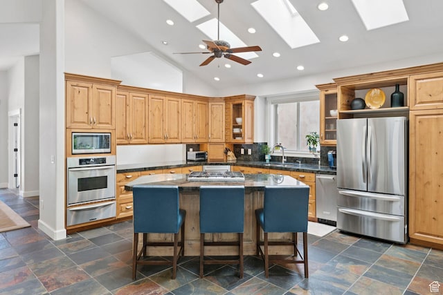 3231 E Lantern Hill Ct S, Cottonwood Heights, UT 84093 - kitchen featuring stainless steel appliances, a warming drawer, a skylight, open shelves, and recessed lighting