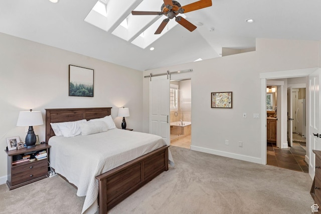 3231 E Lantern Hill Ct S, Cottonwood Heights, UT 84093 - carpeted bedroom featuring lofted ceiling, a barn door, recessed lighting, a skylight, and connected bathroom