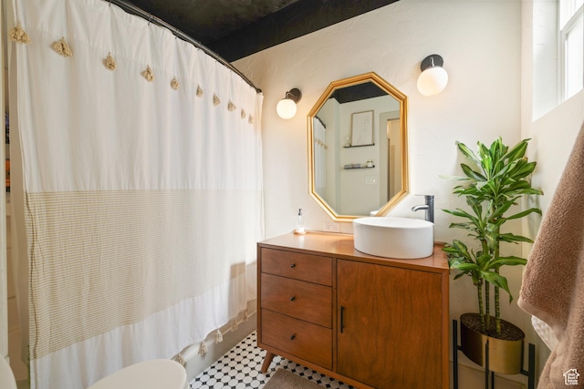 922 S 400 E, Salt Lake City, UT 84111 - full bathroom with vanity, shower / bath combo, and tile patterned floors