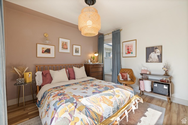 922 S 400 E, Salt Lake City, UT 84111 - bedroom featuring wood finished floors and baseboards