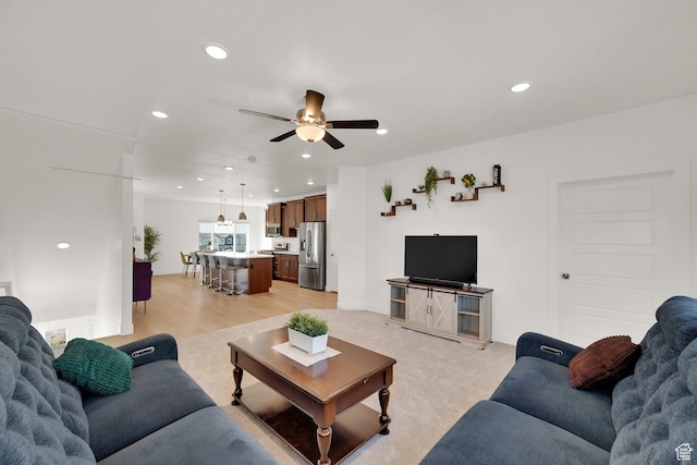 672 E 730 N Unit 25, Hyrum, UT 84319 - living room featuring ceiling fan, recessed lighting, and light wood-style flooring
