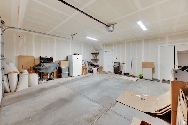 672 E 730 N Unit 25, Hyrum, UT 84319 - garage featuring a garage door opener