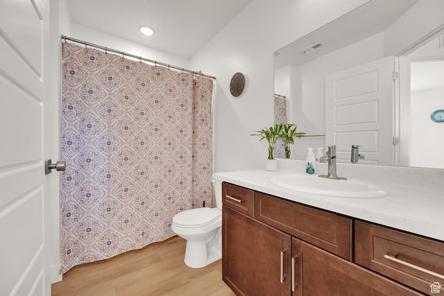 672 E 730 N Unit 25, Hyrum, UT 84319 - full bathroom featuring vanity, wood finished floors, recessed lighting, and curtained shower