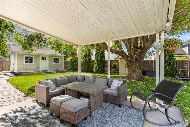 883 E 1775 N, North Ogden, UT 84414 - fenced backyard featuring an outbuilding, a patio area, and outdoor lounge area