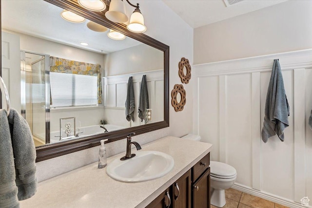 883 E 1775 N, North Ogden, UT 84414 - full bathroom with a stall shower, vanity, a bath, and tile patterned floors
