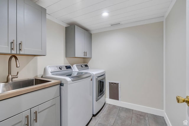 2541 S 1400 W, Woods Cross, UT 84087 - laundry area featuring separate washer and dryer, cabinet space, recessed lighting, light tile patterned floors, and wooden ceiling