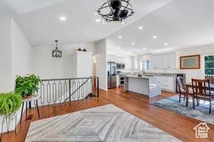 2541 S 1400 W, Woods Cross, UT 84087 - living area featuring wood finished floors, a chandelier, and recessed lighting