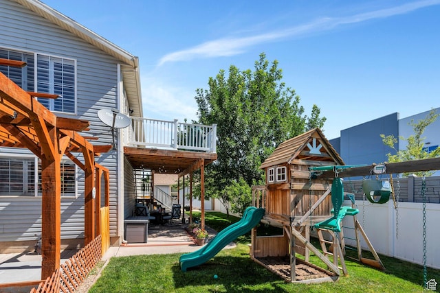 2541 S 1400 W, Woods Cross, UT 84087 - view of play area with a fenced backyard, a patio, and a wooden deck
