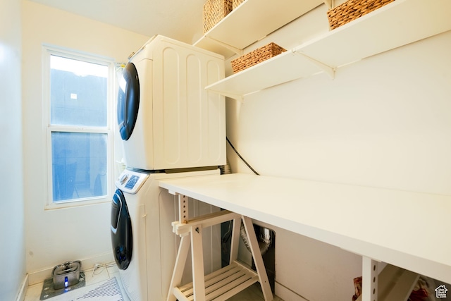 4759 W Vermillion Dr, South Jordan, UT 84009 - laundry room with stacked washer / dryer and baseboards
