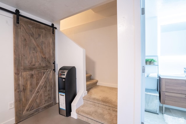 4759 W Vermillion Dr, South Jordan, UT 84009 - stairway featuring a barn door and baseboards