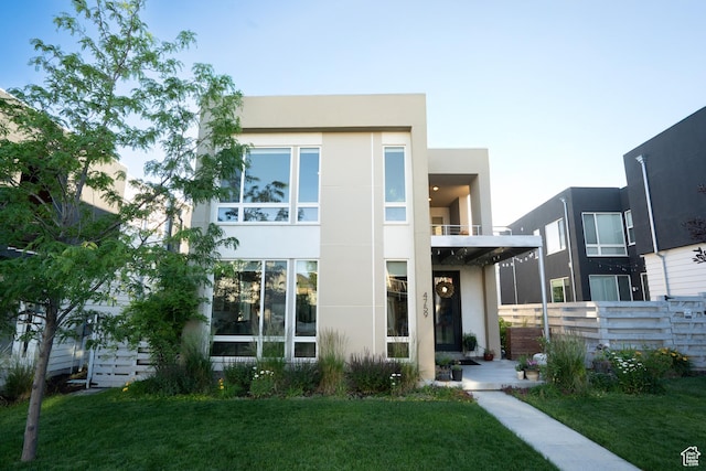 4759 W Vermillion Dr, South Jordan, UT 84009 - contemporary home featuring stucco siding and a balcony