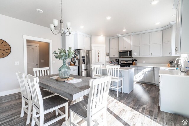 16 N 1000 E, Hyde Park, UT 84318 - dining area featuring dark wood-type flooring, a chandelier, and recessed lighting
