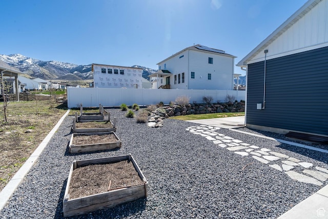 16 N 1000 E, Hyde Park, UT 84318 - view of yard featuring a vegetable garden and a mountain view