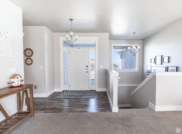 16 N 1000 E, Hyde Park, UT 84318 - carpeted foyer featuring a chandelier and wood finished floors