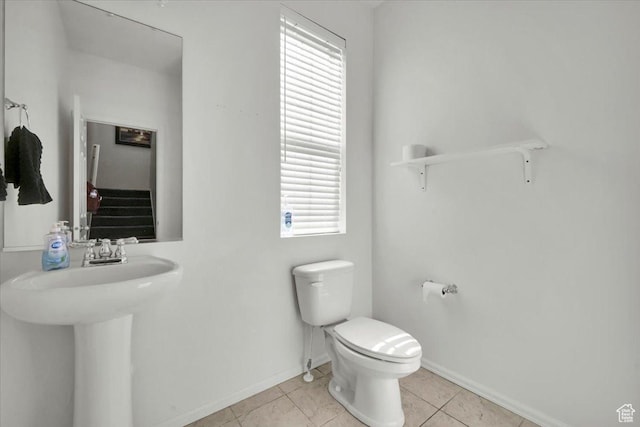 4439 W Mille Lacs Dr, South Jordan, UT 84009 - half bathroom featuring toilet and tile patterned flooring