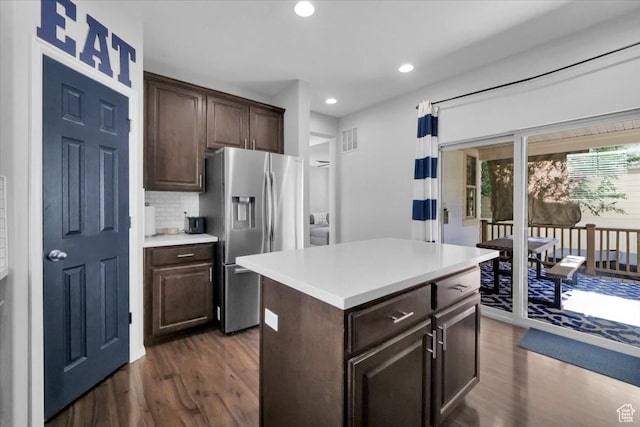 4439 W Mille Lacs Dr, South Jordan, UT 84009 - kitchen with stainless steel fridge with ice dispenser, dark wood-style floors, dark brown cabinets, and recessed lighting