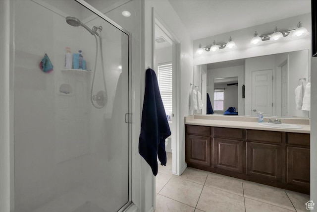 4439 W Mille Lacs Dr, South Jordan, UT 84009 - full bath featuring a shower stall, vanity, tile patterned floors, and ensuite bath