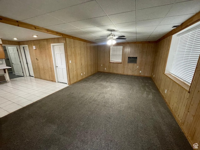 1721 N 750 W, Harrisville, UT 84404 - unfurnished living room with wood walls, light carpet, and a drop ceiling