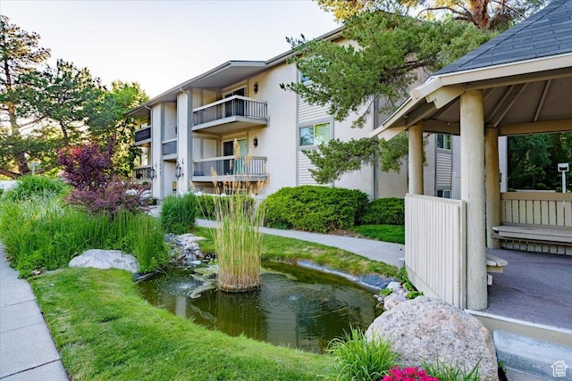 4879 S 1690 E, Holladay, UT 84117 - view of property's community featuring a garden pond