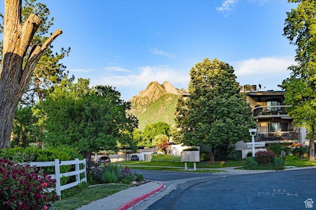 4879 S 1690 E, Holladay, UT 84117 - view of asphalt road with sidewalks and curbs