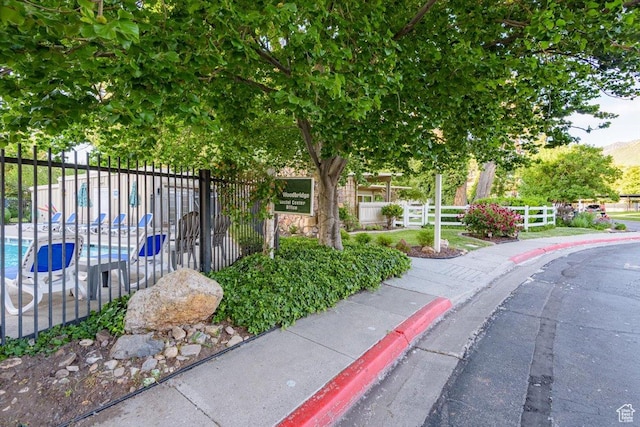 4879 S 1690 E, Holladay, UT 84117 - view of asphalt street with sidewalks and curbs